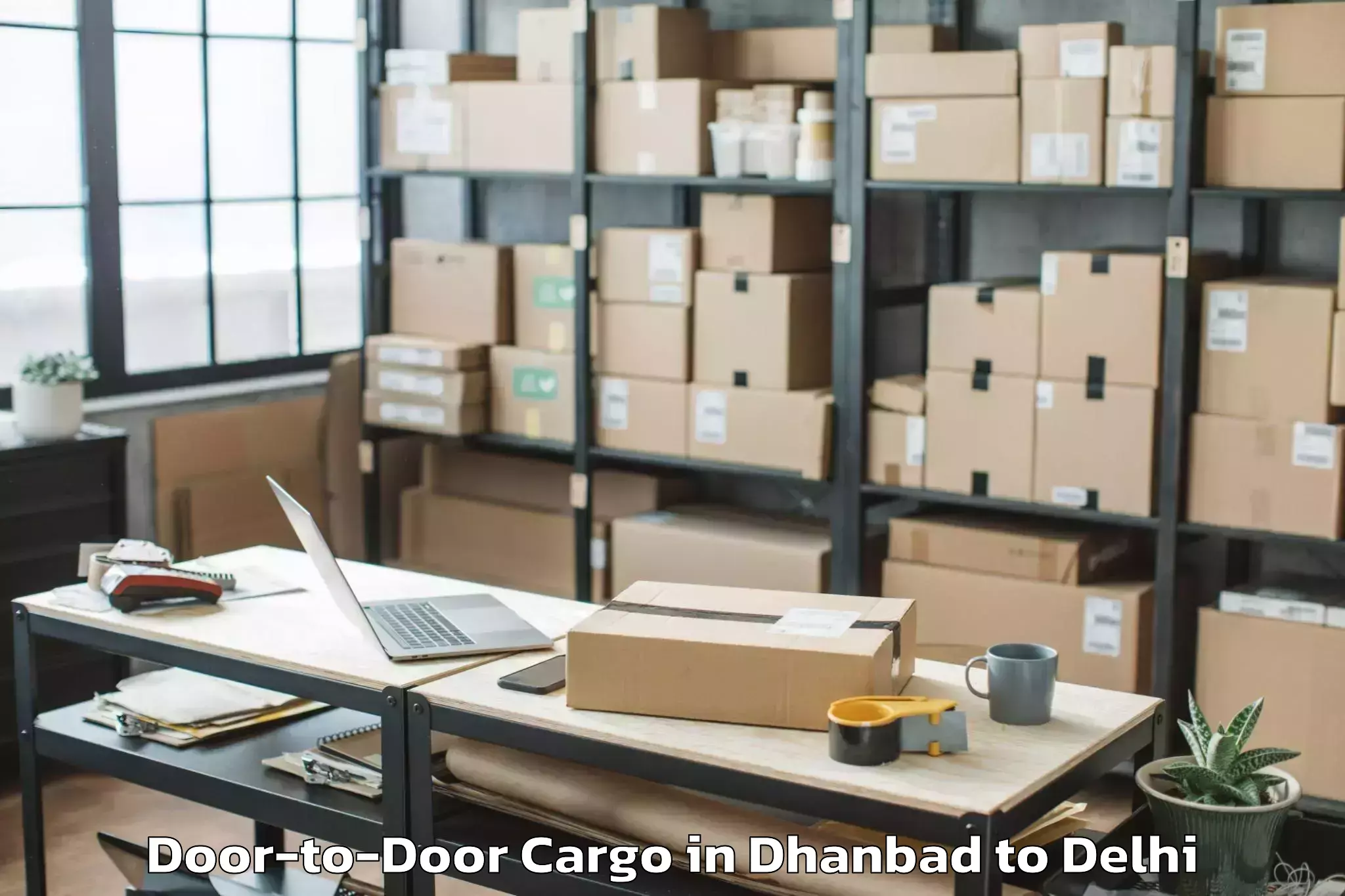 Quality Dhanbad to Pacific D21 Mall Door To Door Cargo